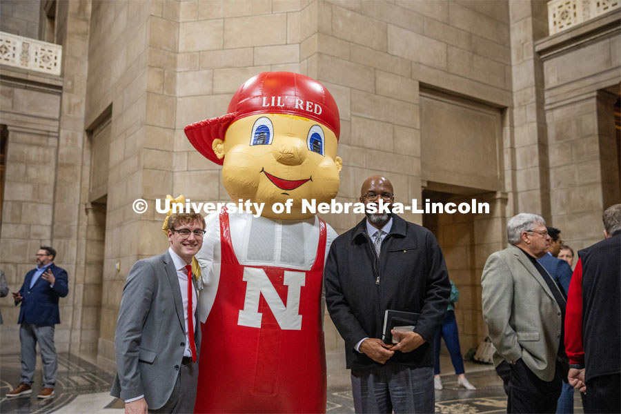Student Body President and Student Regent, Paul Pechous (left), poses with Lil Red and Chancellor Rodney Bennett at the I love NU Day event in the Rotunda of the Nebraska State Capitol. March 6, 2024. Photo by Kristen Labadie / University Communication.